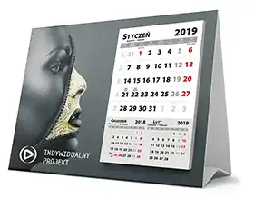 Desktop calendar with a breakable calendar